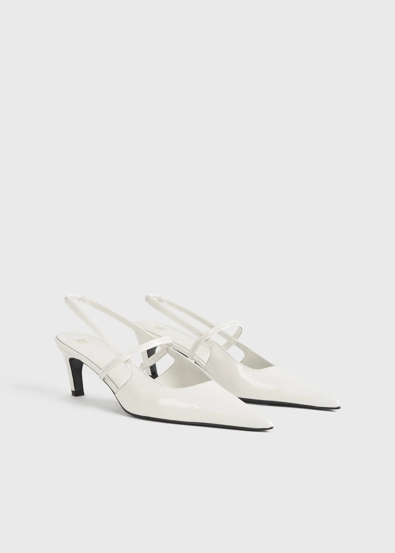 Sharp patent-leather slingbacks off white